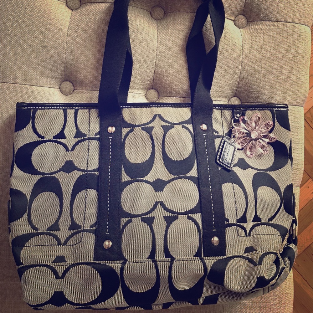 Coach black and beige signature tote bag.